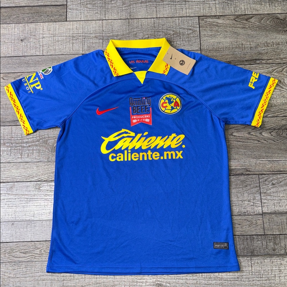 Nike Royal Blue Soccer Jersey with Yellow Accents